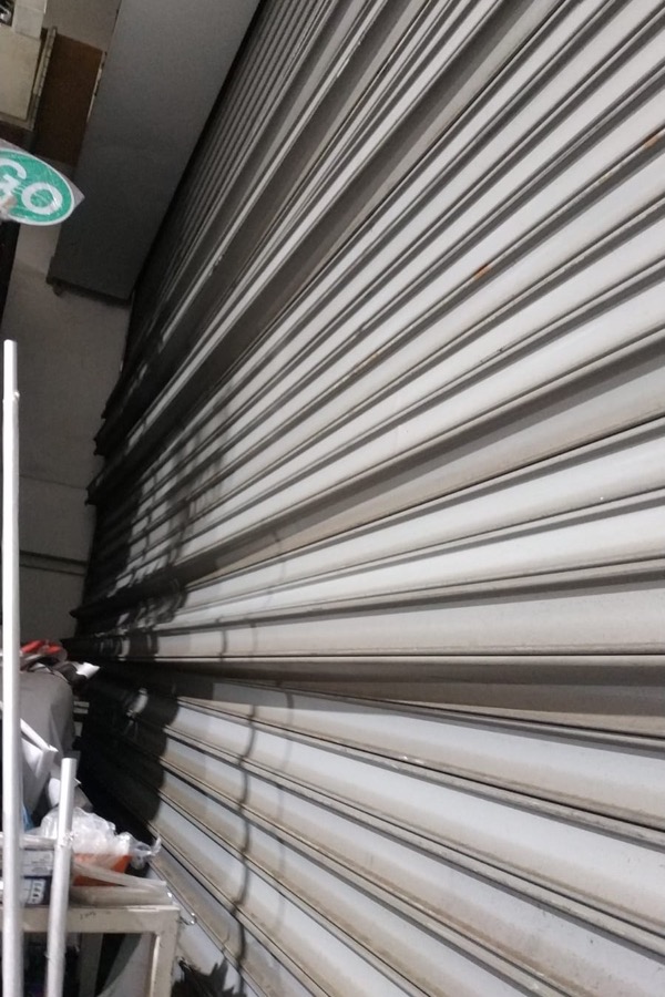 Bent roller shutter slats requiring repair